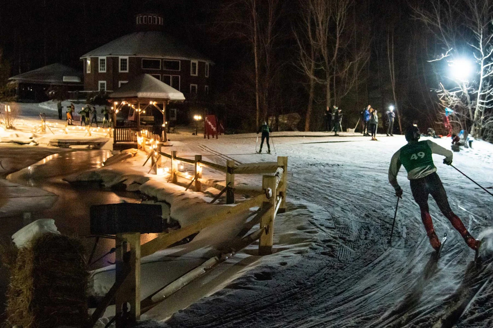 Night skiing at Sleepy Hollow with skier under the lights at the Wednesday Night Race Series