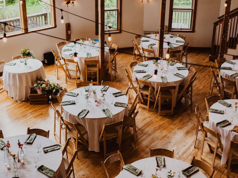 Wedding tables set in the Round Barn