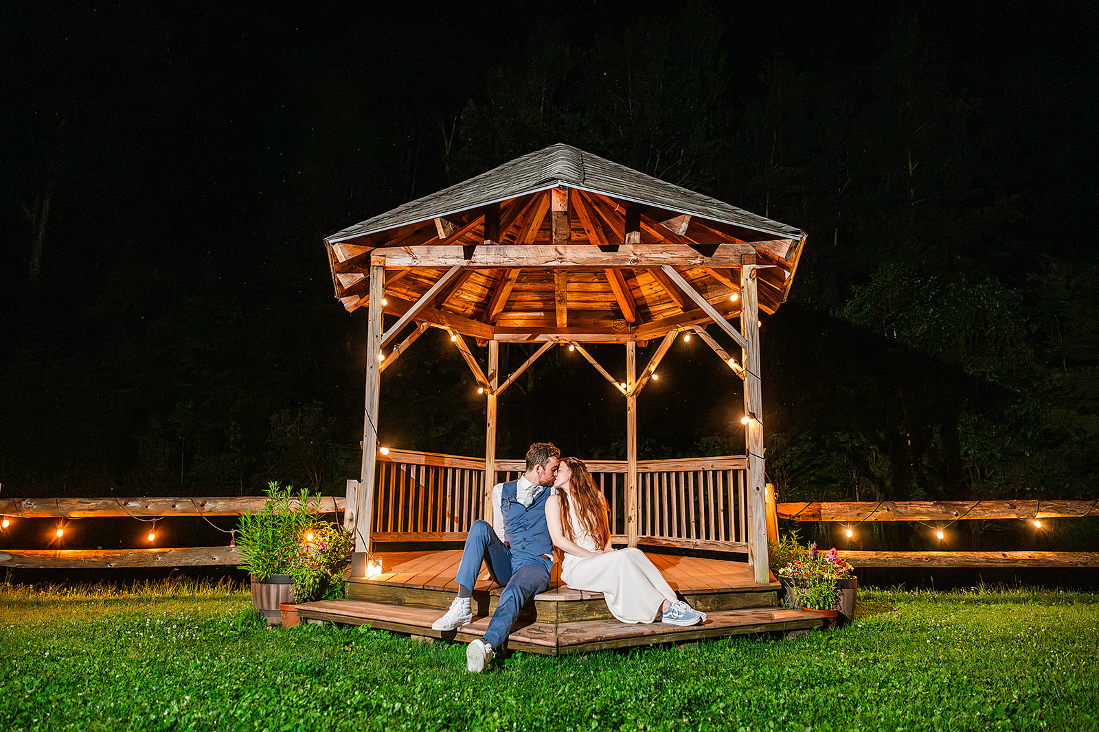 Whimsical Woodland Wedding at Sleepy Hollow Inn 30 Bride and Groom at the gazebo at night