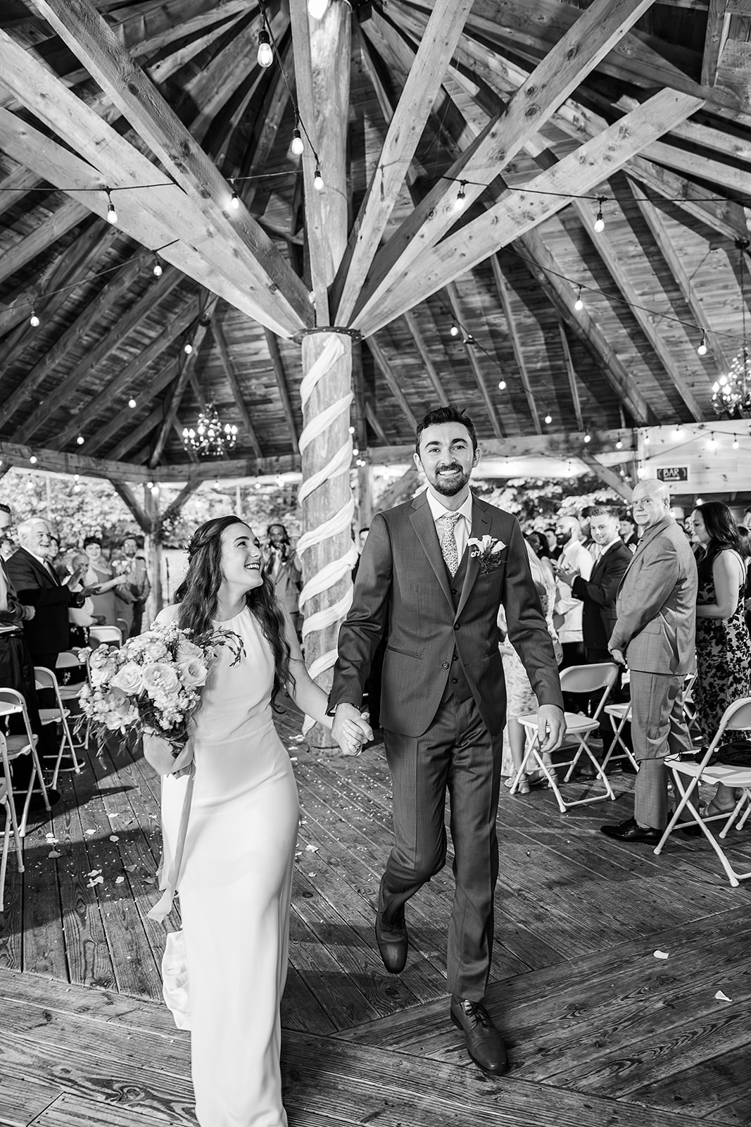 Whimsical Woodland Wedding at Sleepy Hollow Inn 12 wedding couple walking down the aisle