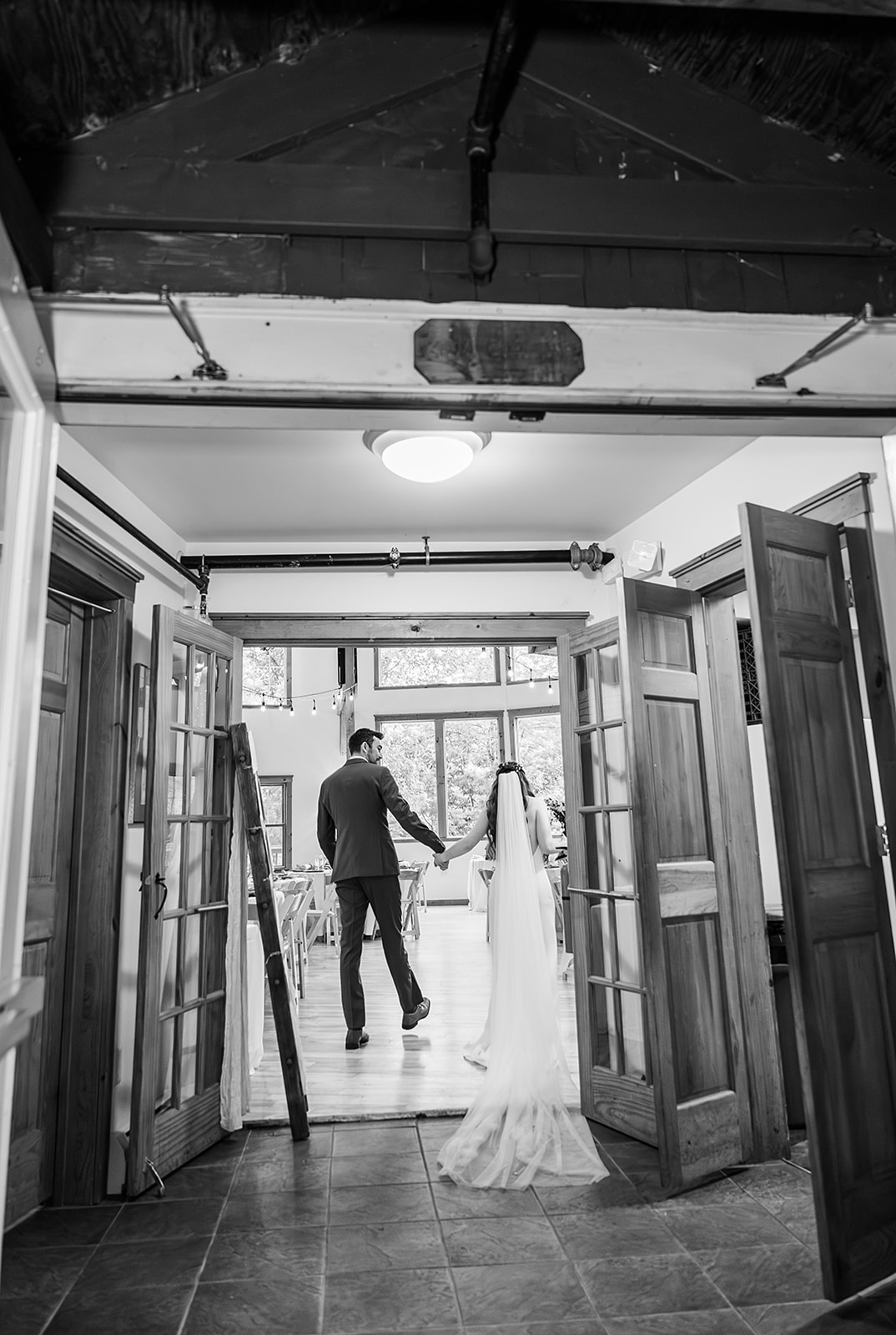 Whimsical Woodland Wedding at Sleepy Hollow Inn 19 Wedding couple looking at their dinner set up