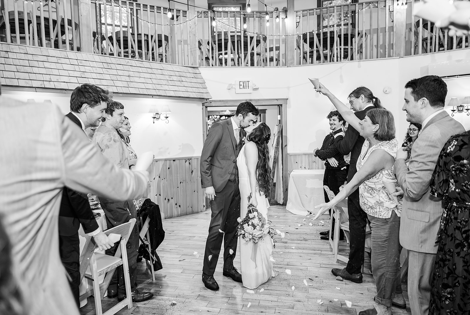 Whimsical Woodland Wedding at Sleepy Hollow Inn 16 couple showered with flowers